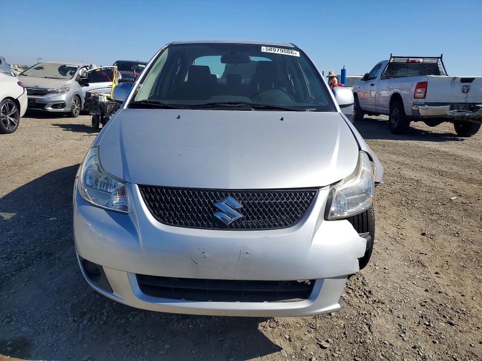 Photo 5 from auction – 2013 SUZUKI SX4 with VIN JS2YC5A30D6101905