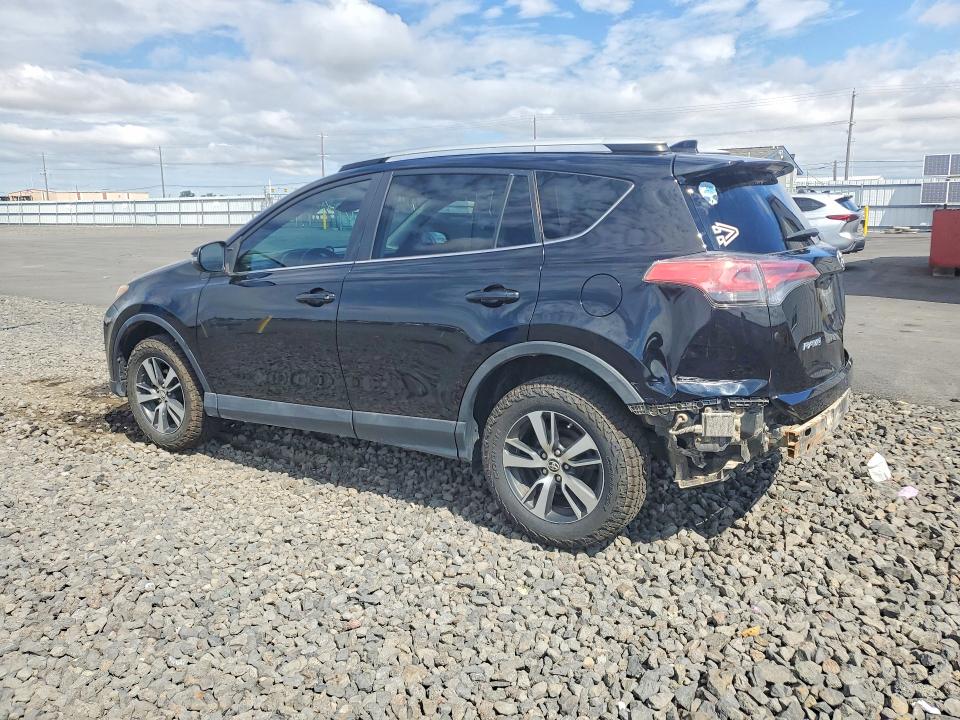Фото 2 с аукциона – 2016 TOYOTA RAV4 с VIN 2T3RFREV8GW410971