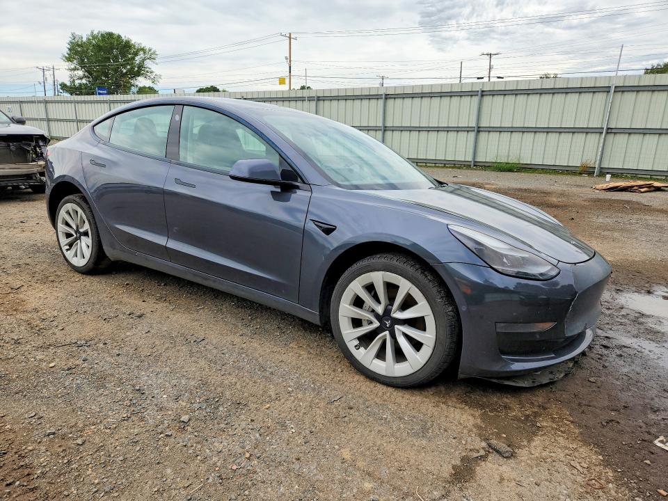 Photo 4 from auction – 2022 TESLA MODEL 3 with VIN 5YJ3E1EAXNF185219