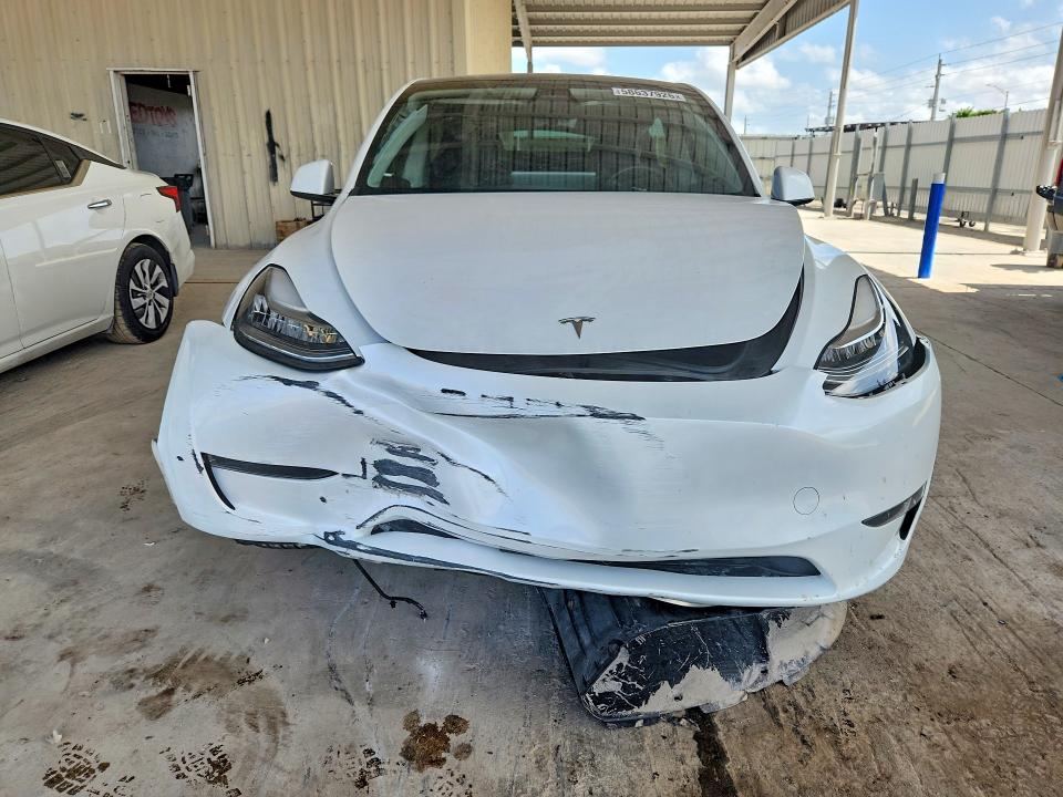 Photo 5 from auction – 2023 TESLA MODEL Y with VIN 7SAYGDEE6PA138521