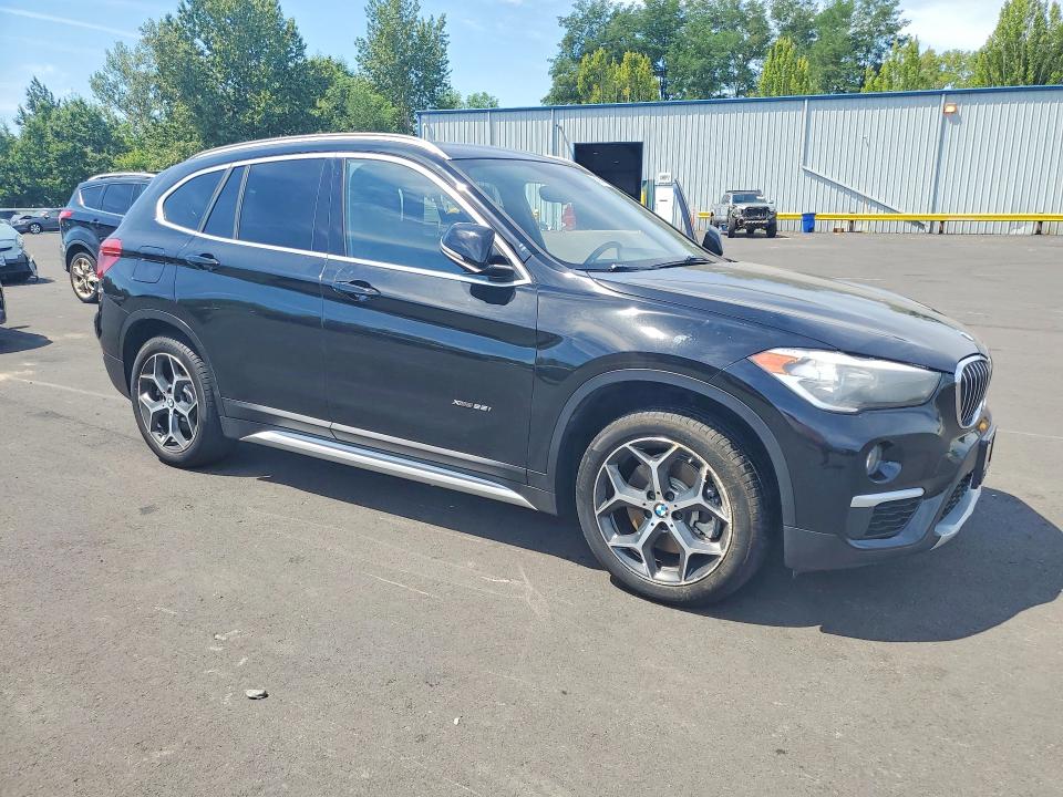 Photo 4 from auction – 2018 BMW X1 with VIN WBXHT3C30J5L24459