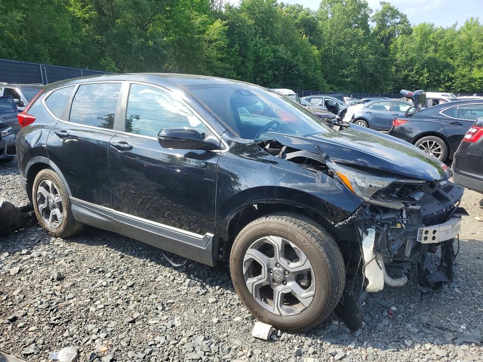 Photo 4 from auction – 2018 HONDA CR-V with VIN 7FARW1H54JE023624