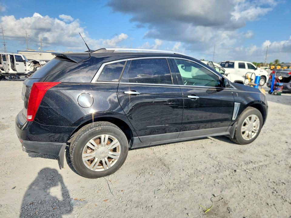 Photo 3 from auction – 2014 CADILLAC SRX with VIN 3GYFNBE31ES523046