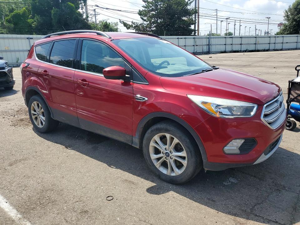 Photo 4 from auction – 2018 FORD ESCAPE with VIN 1FMCU9GD3JUC33598