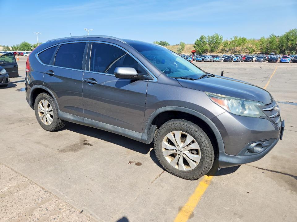 Photo 4 from auction – 2014 HONDA CR-V with VIN 2HKRM4H79EH650430