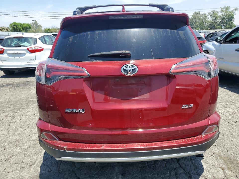 Photo 6 from auction – 2018 TOYOTA RAV4 with VIN 2T3WFREV5JW477411