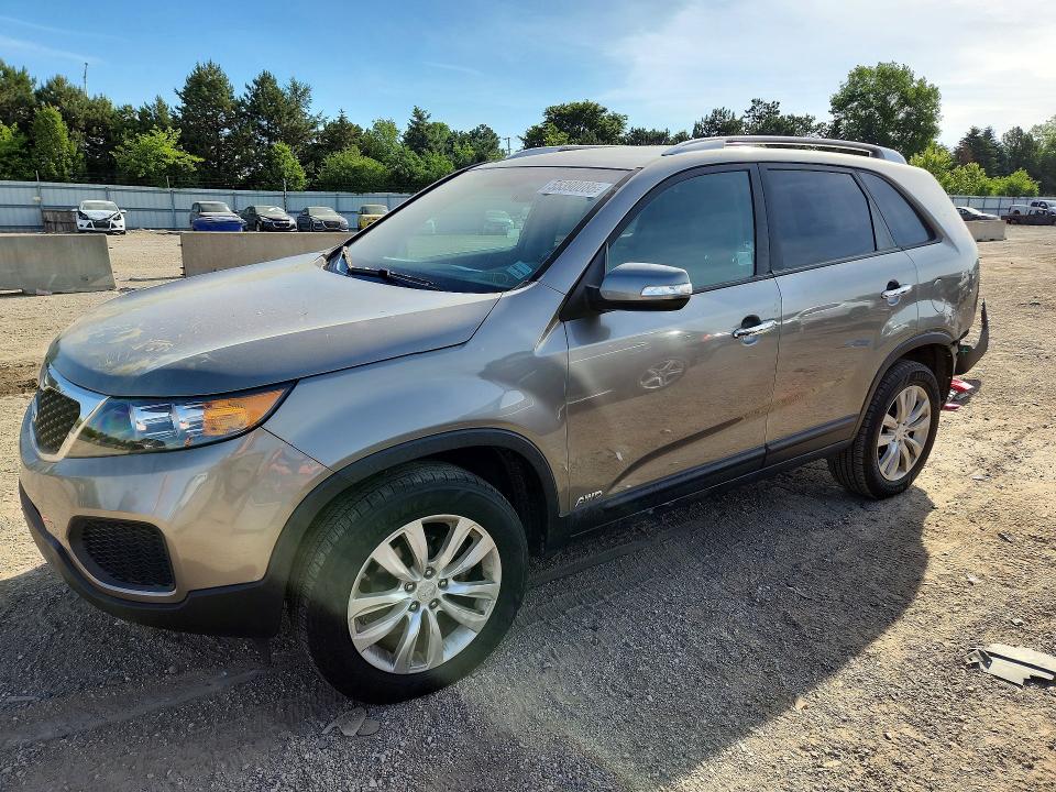 KIA SORENTO 2011 with VIN 5XYKTDA23BG047558 - Photo from auction