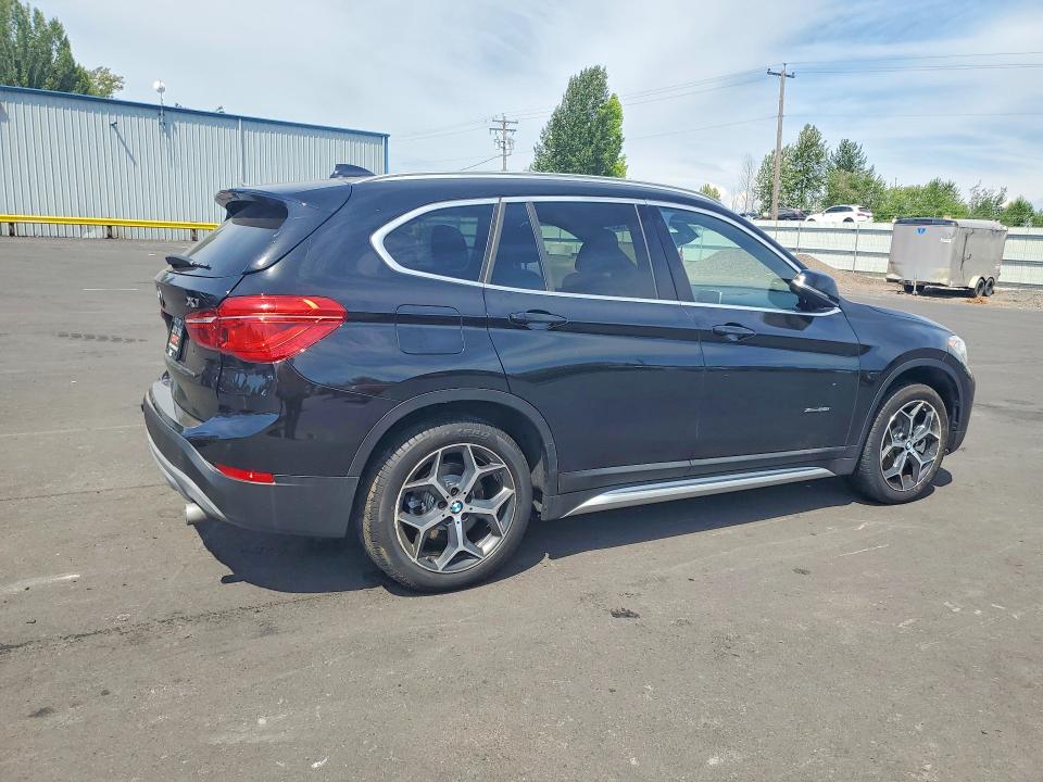 Photo 3 from auction – 2018 BMW X1 with VIN WBXHT3C30J5L24459