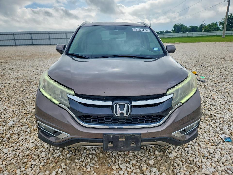 Photo 5 from auction – 2015 HONDA CR-V with VIN 2HKRM3H75FH510211