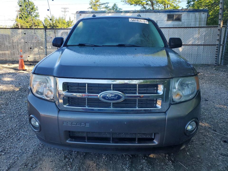 Photo 5 from auction – 2011 FORD ESCAPE with VIN 1FMCU0D70BKA73297