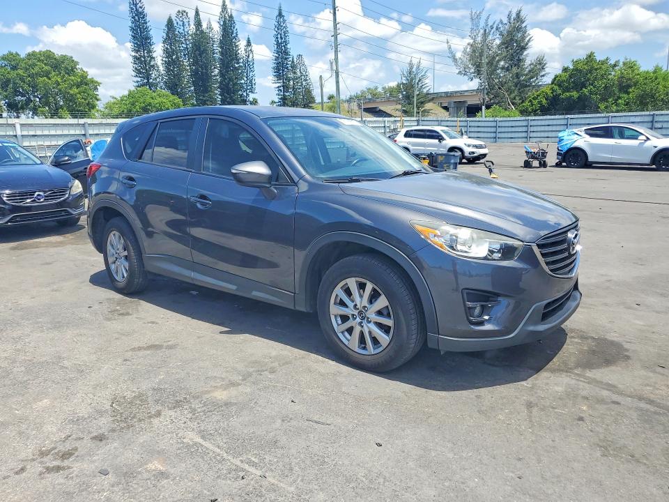 Photo 4 from auction – 2016 MAZDA CX-5 with VIN JM3KE2CYXG0900641