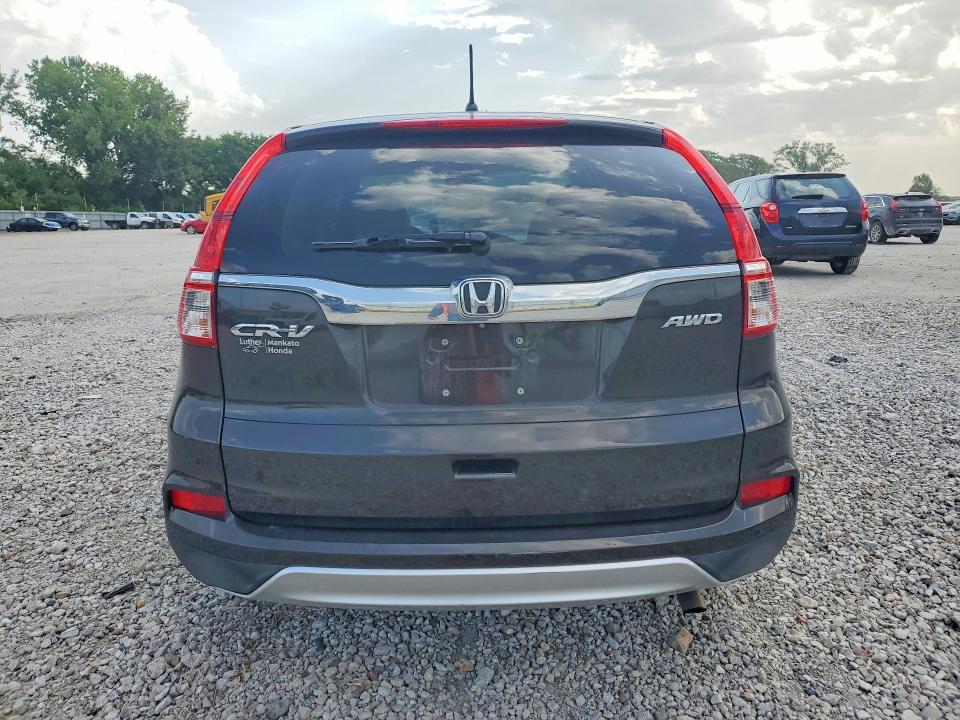 Photo 6 from auction – 2016 HONDA CR-V with VIN 5J6RM4H56GL116566