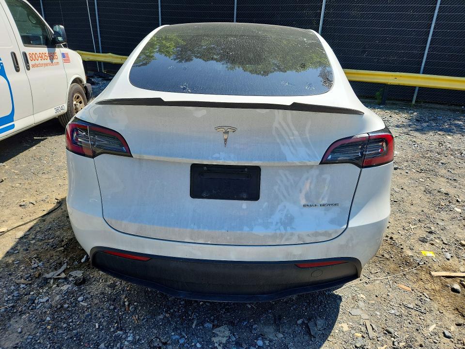 Photo 6 from auction – 2023 TESLA MODEL Y with VIN 7SAYGDEE6PF672573