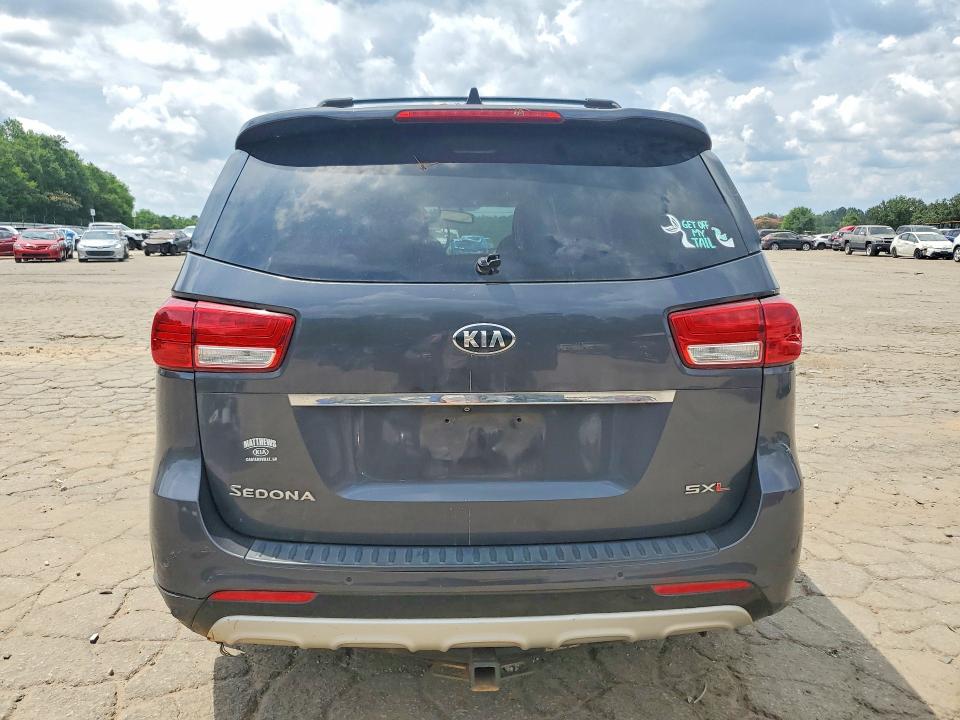 Photo 6 from auction – 2015 KIA SEDONA with VIN KNDME5C16F6029920