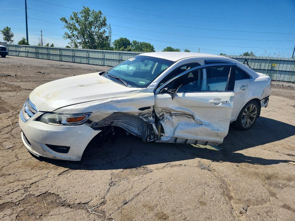 FORD TAURUS 2012 with VIN 1FAHP2EW7CG134030 - Photo from auction