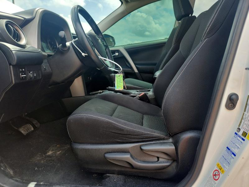 Photo 7 from auction – 2018 TOYOTA RAV4 with VIN 2T3RFREV2JW701411