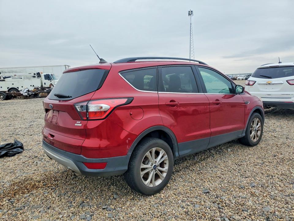 Photo 3 from auction – 2018 FORD ESCAPE with VIN 1FMCU0GD6JUD03199