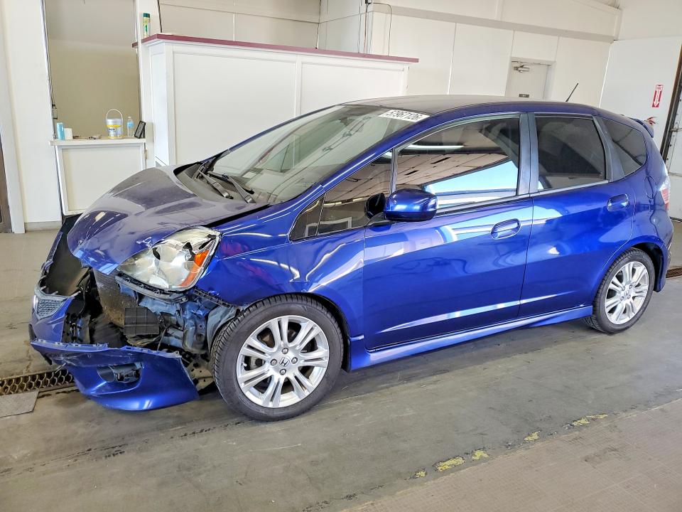 HONDA FIT 2011 with VIN JHMGE8H55BC015303 - Photo from auction