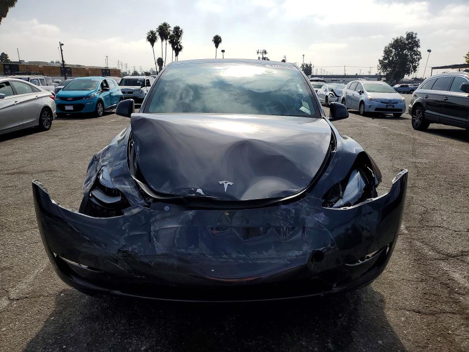 Photo 5 from auction – 2024 TESLA MODEL Y with VIN 7SAYGDEE8RA234847