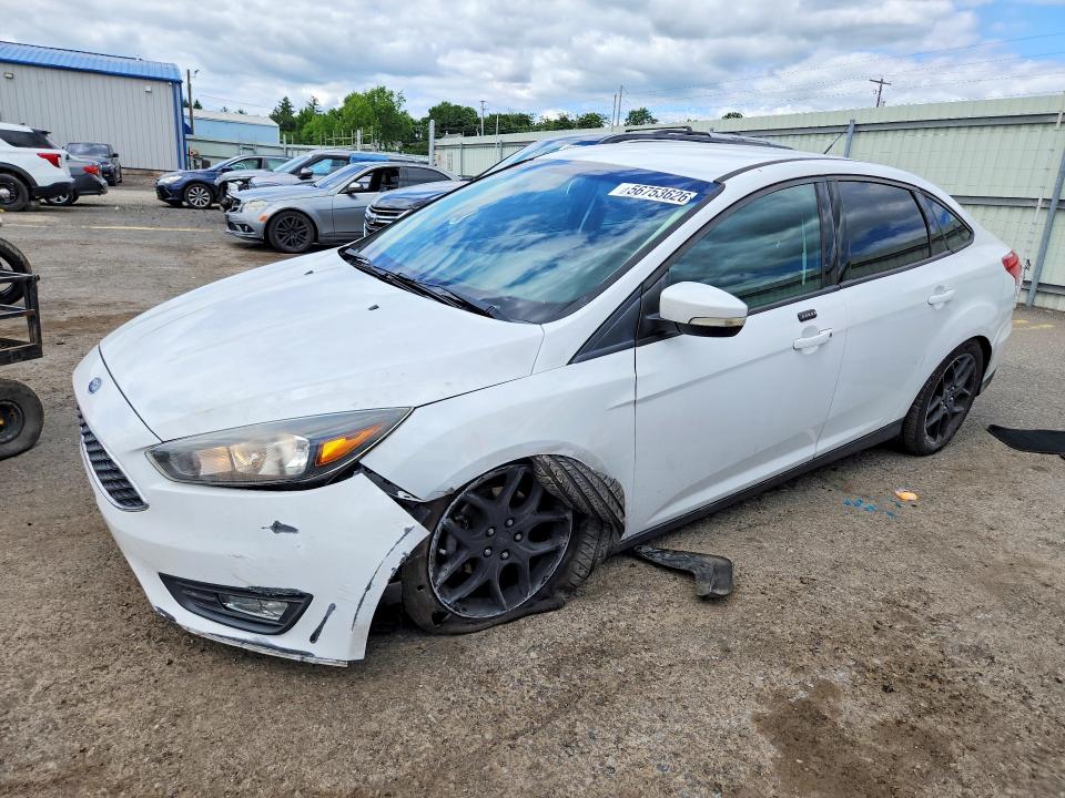 FORD FOCUS 2016 with VIN 1FADP3F21GL209382 - Photo from auction