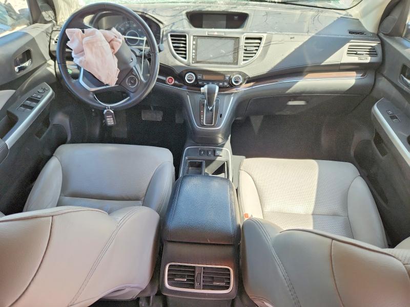 Photo 8 from auction – 2016 HONDA CR-V with VIN 2HKRM3H74GH514008