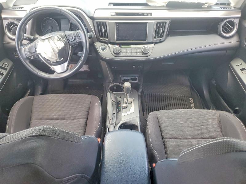 Photo 8 from auction – 2018 TOYOTA RAV4 with VIN JTMRFREV4JD230214