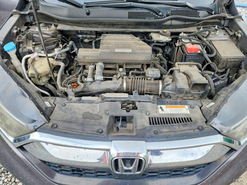 Photo 12 from auction – 2018 HONDA CR-V with VIN 7FARW1H59JE021349