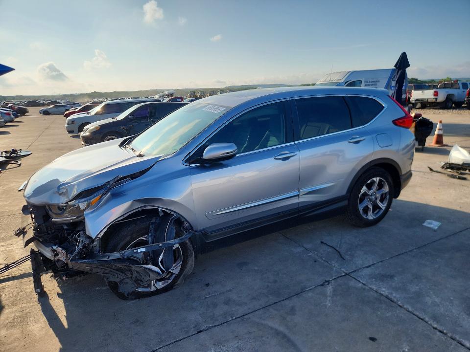 Photo 1 from auction – 2019 HONDA CR-V with VIN 7FARW1H5XKE027016