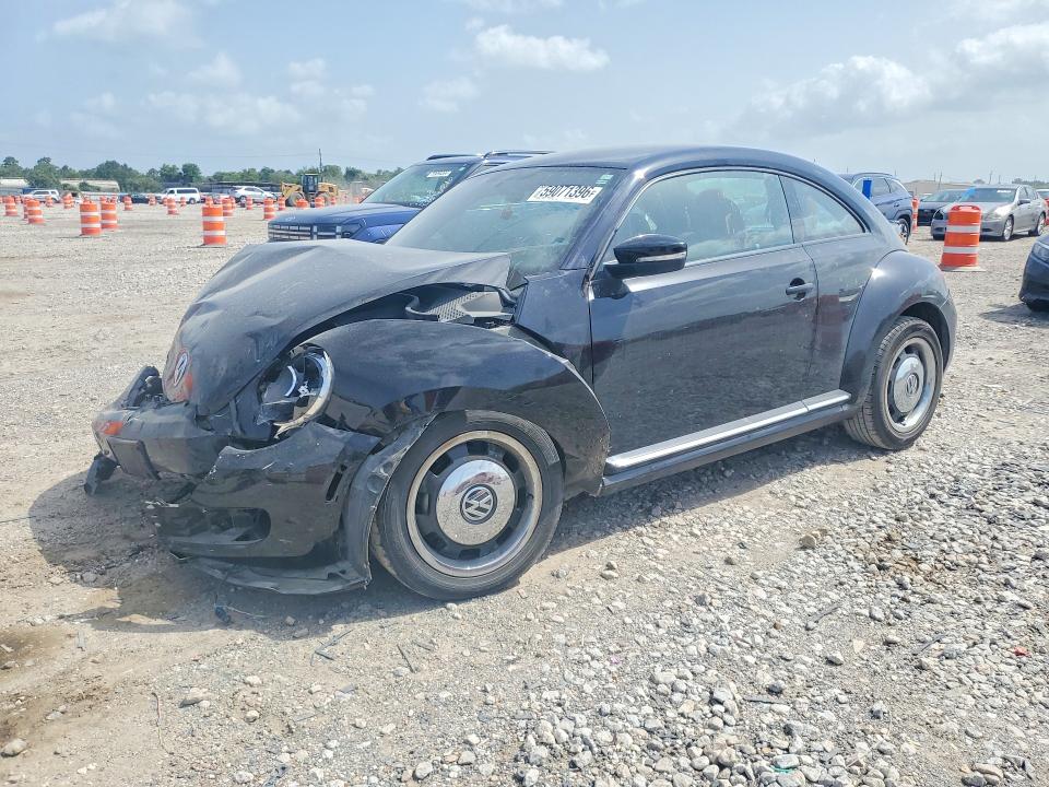 VOLKSWAGEN BEETLE 2016 with VIN 3VWF17AT2GM634729 - Photo from auction