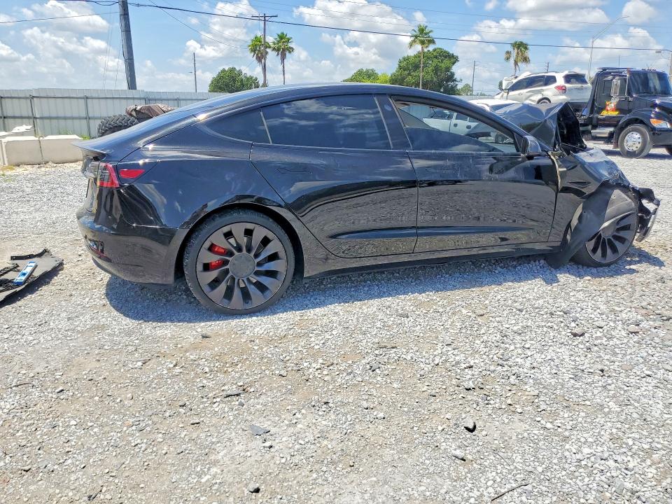 Photo 3 from auction – 2022 TESLA MODEL 3 with VIN 5YJ3E1EC5NF123535