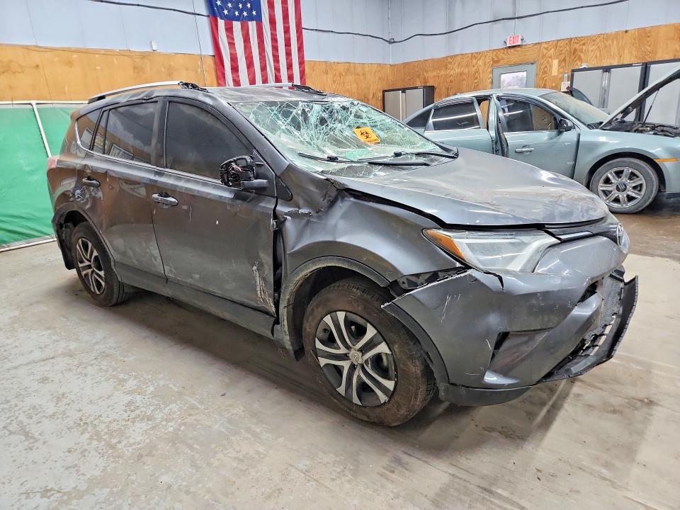 Photo 4 from auction – 2016 TOYOTA RAV4 with VIN JTMZFREV7GJ094641