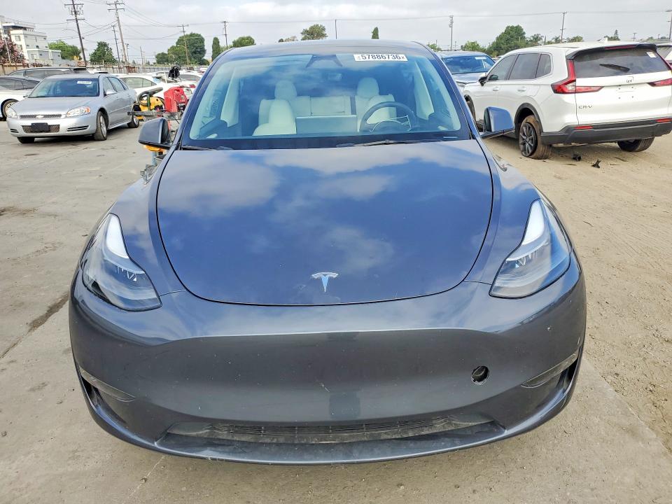 Photo 5 from auction – 2023 TESLA MODEL Y with VIN 7SAYGDEE0PF840045