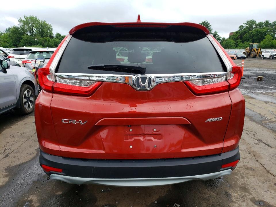 Photo 6 from auction – 2017 HONDA CR-V with VIN 2HKRW2H81HH606532