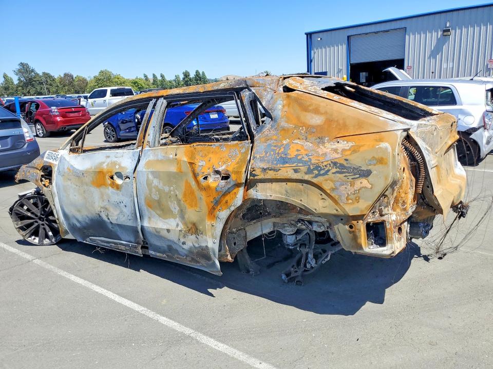 Photo 2 from auction – 2024 TOYOTA BZ4X with VIN JTMABACA1RA071434
