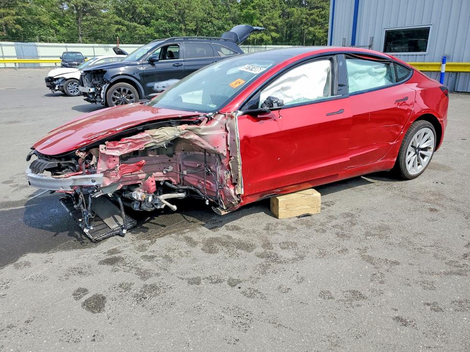 TESLA MODEL 3 2022 with VIN 5YJ3E1EA4NF285610 - Photo from auction