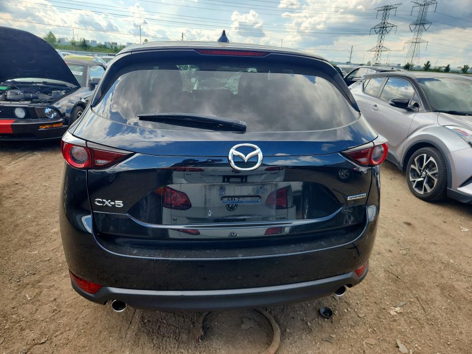 Photo 6 from auction – 2021 MAZDA CX-5 with VIN JM3KFACM5M0323338