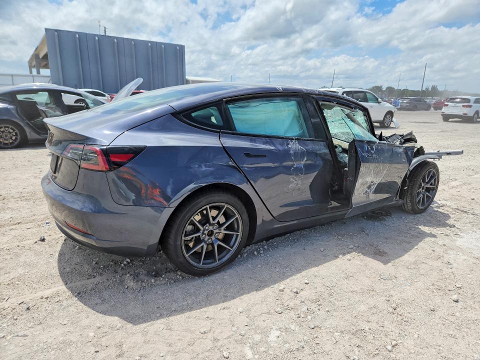 Photo 3 from auction – 2023 TESLA MODEL 3 with VIN 5YJ3E1EA6PF648783