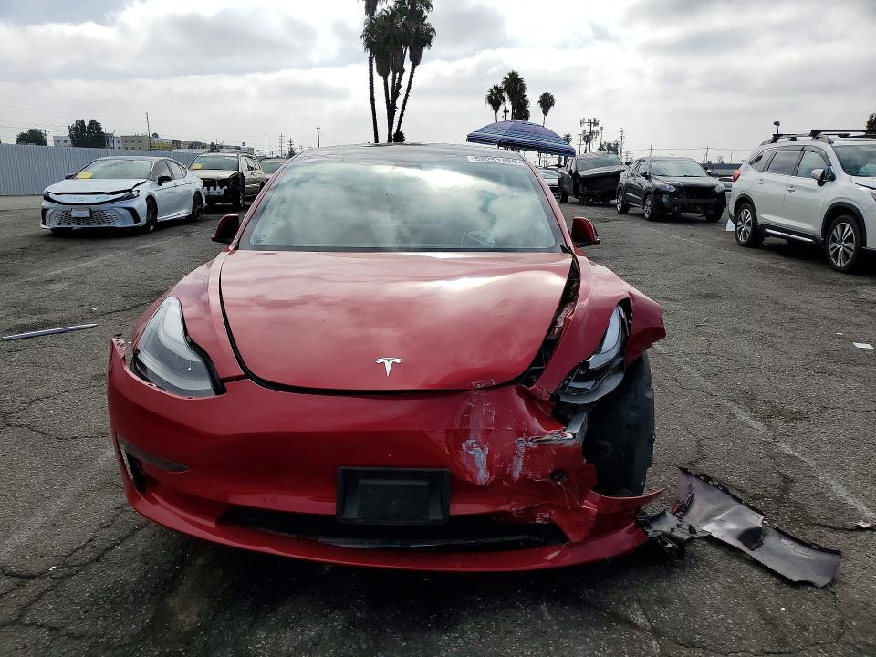 Photo 5 from auction – 2021 TESLA MODEL 3 with VIN 5YJ3E1EA9MF920108