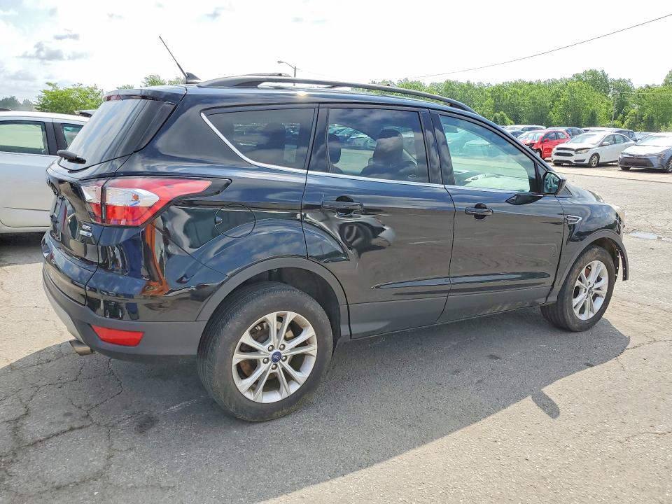 Photo 3 from auction – 2018 FORD ESCAPE with VIN 1FMCU9HD7JUC16236