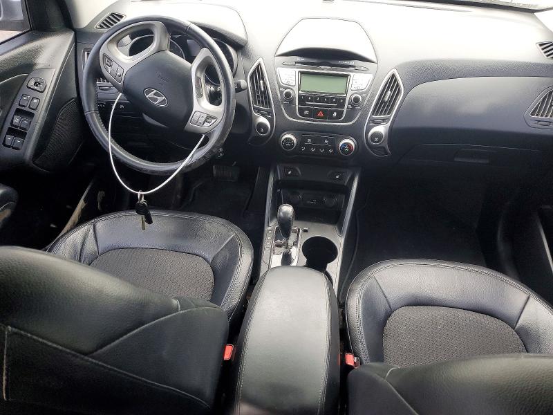 Photo 8 from auction – 2012 HYUNDAI TUCSON with VIN KM8JUCAC5CU459701