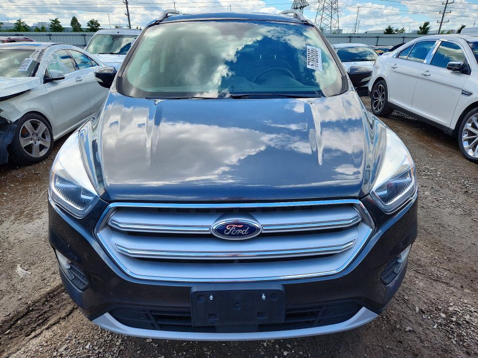 Photo 5 from auction – 2018 FORD ESCAPE with VIN 1FMCU9J95JUD34890