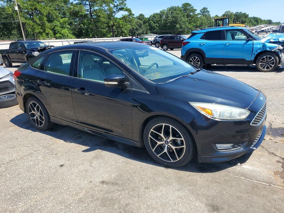 Photo 4 from auction – 2016 FORD FOCUS with VIN 1FADP3F25GL296767