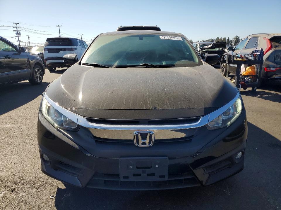 Photo 5 from auction – 2016 HONDA CIVIC with VIN 2HGFC3B39GH354049