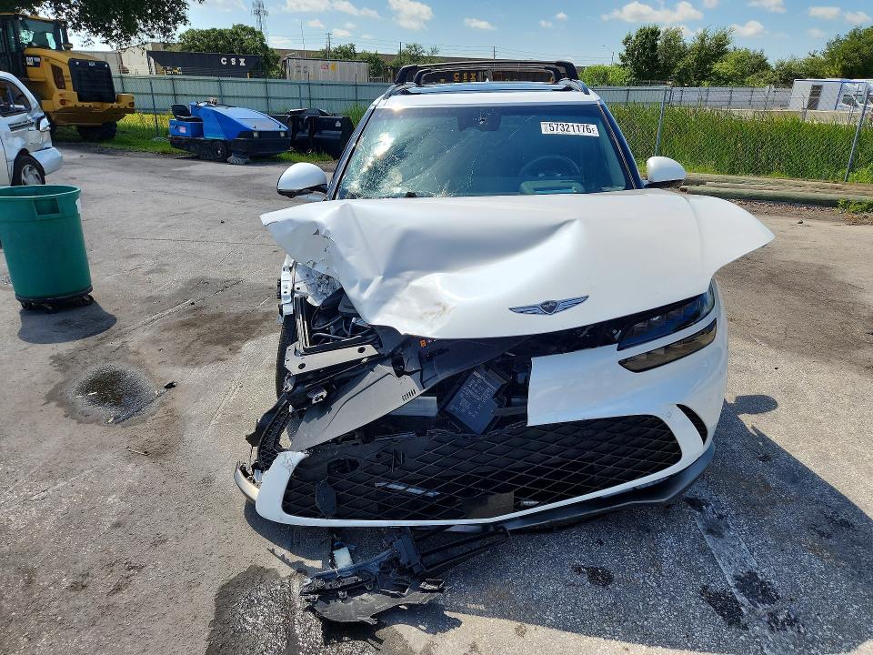 Photo 5 from auction – 2024 GENESIS GV60 with VIN KMUKCDSC0RU025059