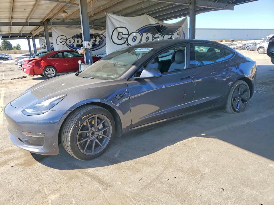 TESLA MODEL 3 2023 with VIN 5YJ3E1EAXPF676358 - Photo from auction