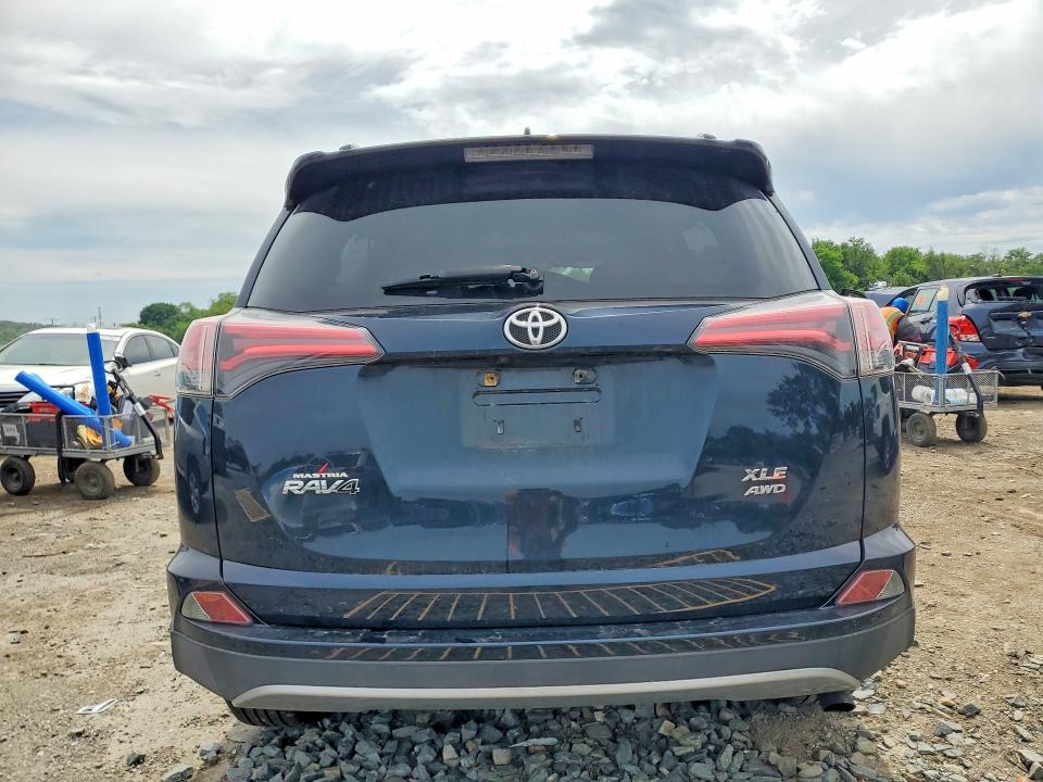 Photo 6 from auction – 2018 TOYOTA RAV4 with VIN JTMRFREV5JD235146