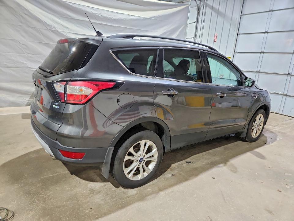 Photo 3 from auction – 2018 FORD ESCAPE with VIN 1FMCU9HD0JUC92784