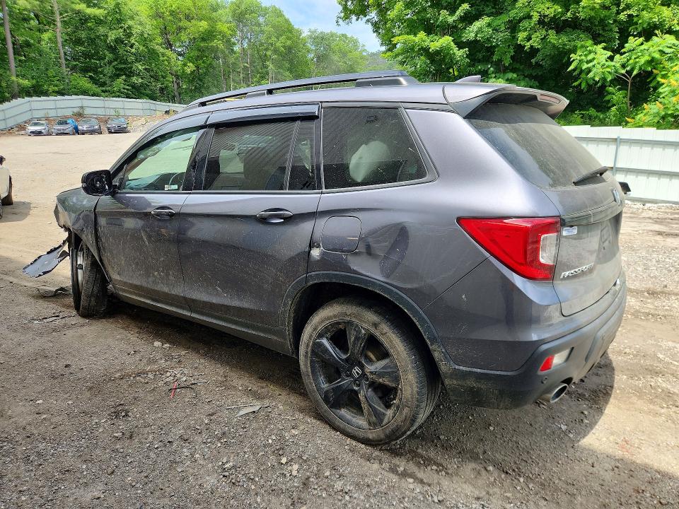 Photo 2 from auction – 2021 HONDA PASSPORT with VIN 5FNYF8H09MB001322