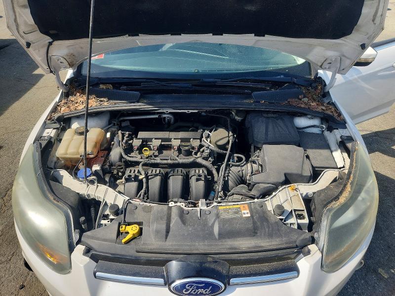 Photo 11 from auction – 2014 FORD FOCUS with VIN 1FADP3J24EL134116