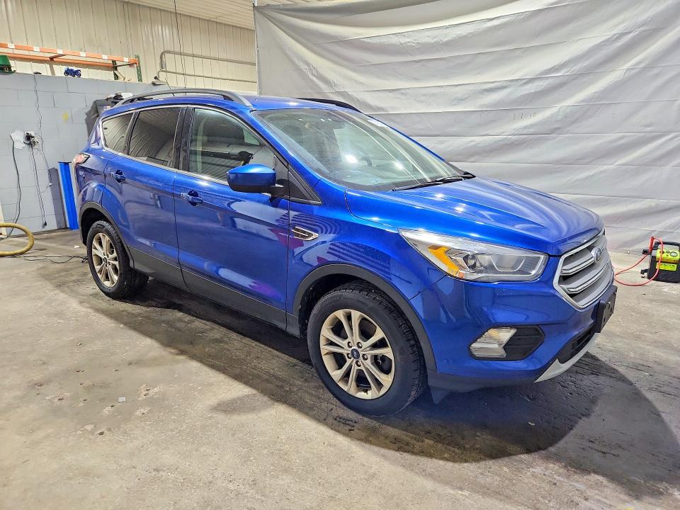 Photo 4 from auction – 2018 FORD ESCAPE with VIN 1FMCU9HD6JUD46007